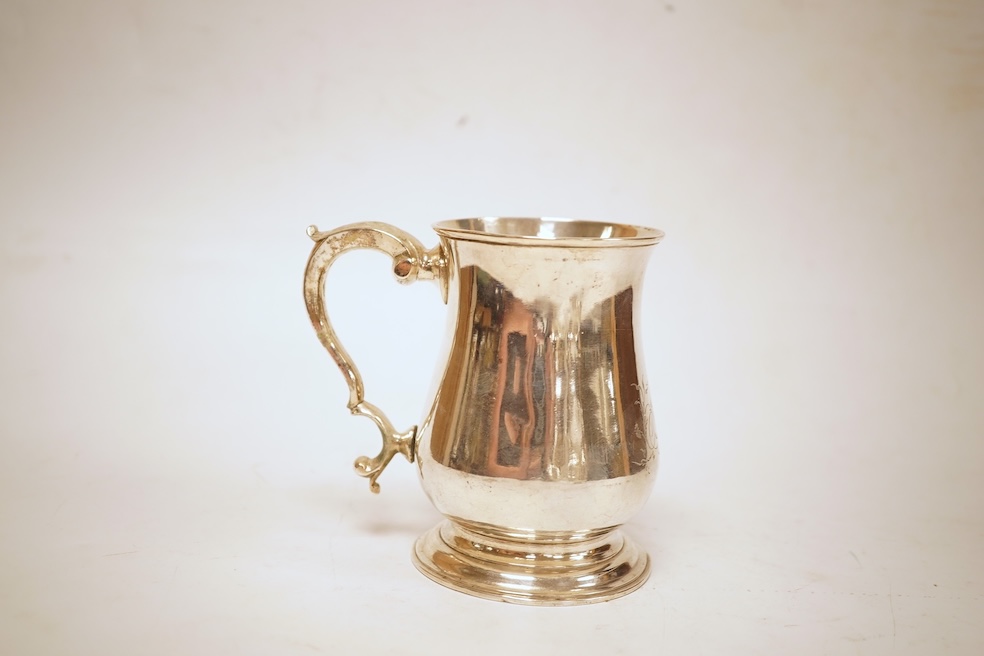 A George III silver baluster mug, by John Payne, London, 1771, height 10.2cm, 7oz.